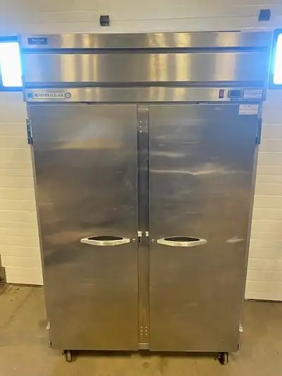 You are viewing a nicely used commercial upright Beverage Air reach-in 2 door restaurant freezer. It...