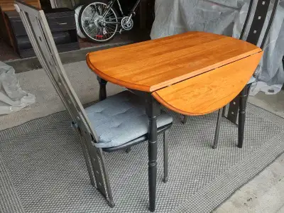 ROUND WOODEN DINING TABLE WITH TWO DROP LEAFS AND TWO CHAIRS , View more