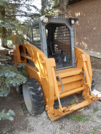 2008 Skid Steer Loader - 1700Lb Operating Capacity Solid Tires, Pilot Controls - Left Direction, Rig...