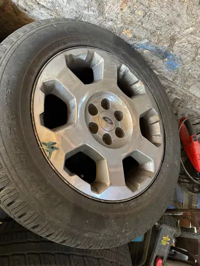 Factor ford f150 20” rims for sale 275/55R20 general grabbers approximately 8/32 left of tree on tir...