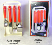 4 Piece tableware set, SS red handles service for 6 on rack