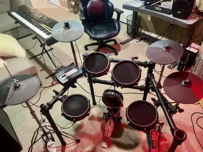 Alesis electronic drumset with powered 100w amplified speaker, View more