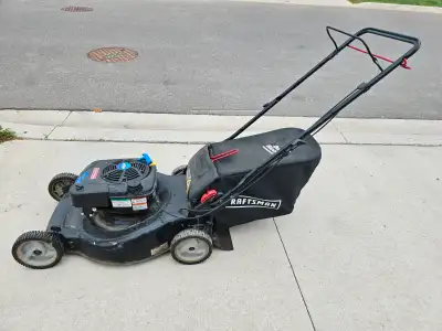 7.25 HP craftsman Briggs and Stratton lawnmower with bag., View more