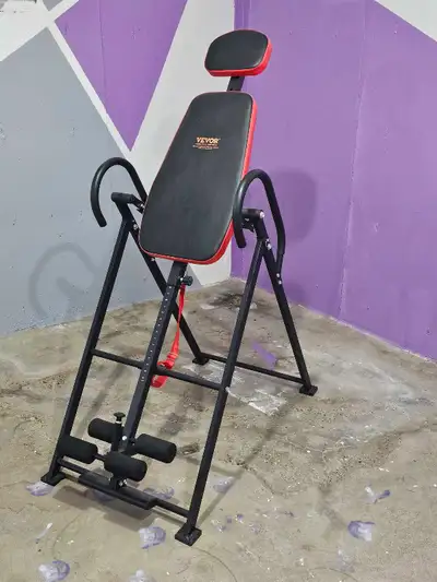 Slightly used inversion table older exercise bike $75 each $100 together or make me an offer 780-285...
