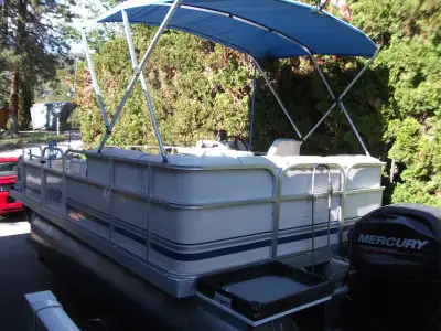 19' Pontoon boat for sale, with trailer and 50 Hp 4 stroke motor. Comes with 2 fishing boat seats, o...
