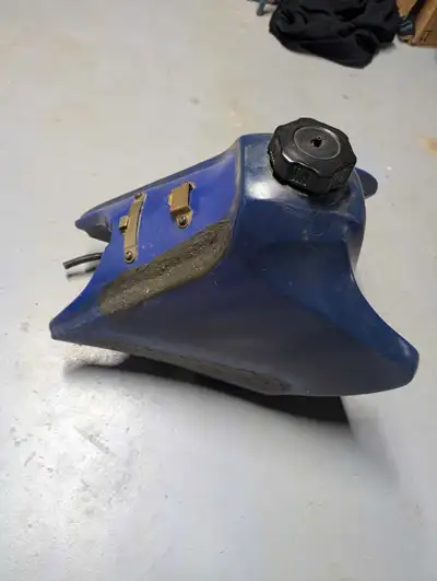 Yamaha TTR 250 gas tank. I attempted to fix by plastic welding. Was unsuccessful. Can be repaired or...