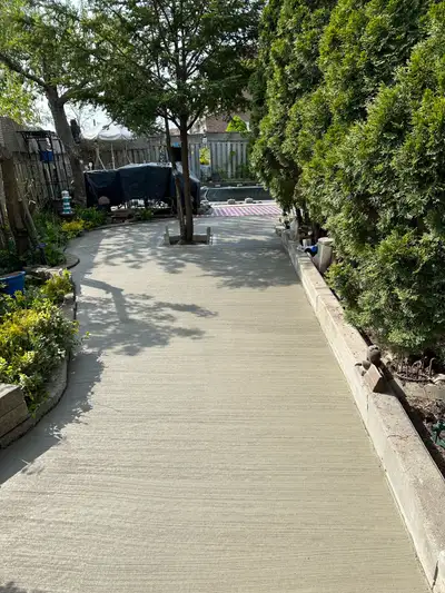 Offering concrete work. Specializing in driveways, walkways, refinish stoops, pool decks, curbs, pad...