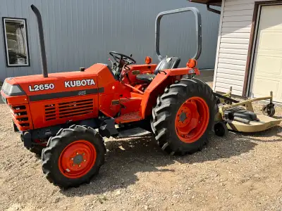 L2650 Kubota yard tractor -72” finish mower -60” cultivator -fertilizer spreader -front end loader -...