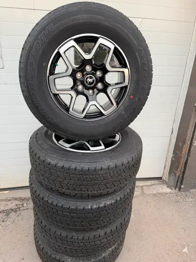 5 Brand new ford Bronco original wheels and new Bridgestone all season tires removed from a 2024 bro...
