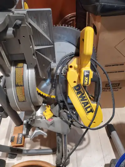 DEWALT Miter Saw with XPS, corded. Like new. Comes with the Ridgid folding Miter stand. Original cos...