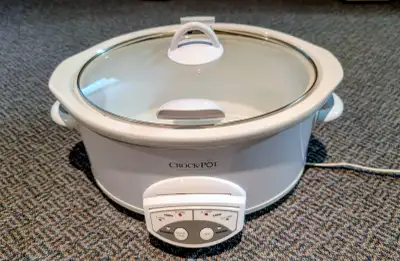 Has been well cared for and works perfectly. Can select the preferred cook time. All parts included