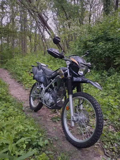 2020 Kawasaki KLX230 street legal motorcycle. Like new only 5500kms. One owner, 90% road use. Low se...