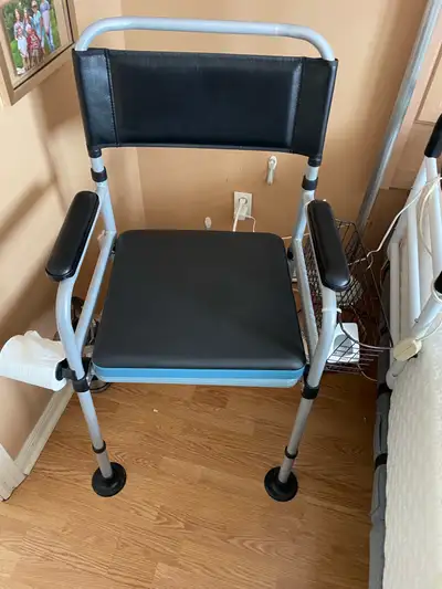 Med aid equipment, chair camode , seldom used and sanitized ,for bedside use100, and a meal tray sta...