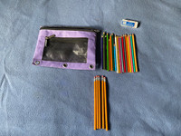 Pencil case with Pencils, Pencil Crayons and eraser, some new