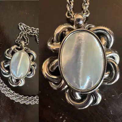 Beautiful absolutely gorgeous piece . Chunky & heavy I guess it is stainless steal , because colour...