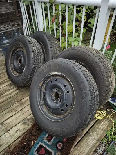 Winter EDGE used 1 season Fits older Ford Escape $200 for 4 tires and rims will not last 235 x 70 x...