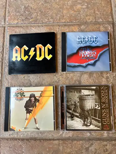 AC/DC Black Ice, Razors Edge and High Voltage CDs Guns N'Roses Chinese Democracy CD $5 each