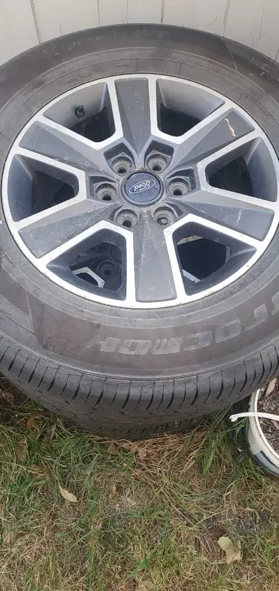 Set of 4 tires and rims from a Ford F150. Tires are dated 2024 275/65R18 tracmax x-privilo h/t Pick...