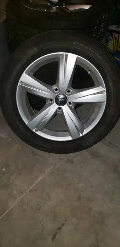 Tires and rims for VW Jetta. 17" rims w/almost new all season Continental ProContact tires.