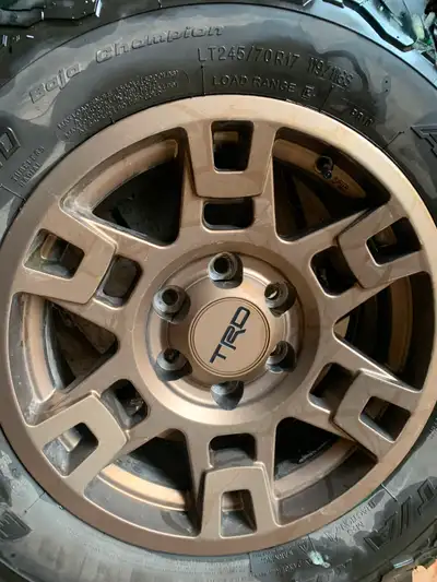 Lightly Used, 17" TRD BRONZE RIMS, k02 LT 245/70/R17. Came off my 2023 Toyota Tacoma. Only used for...