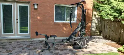 310 Lbs Power Rods, leg extension, lat tower, chest bar, lat pull-down, t-bar, foot harness, owner's...