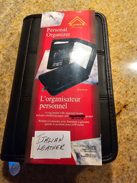 Personal organizer with cell phone holder
