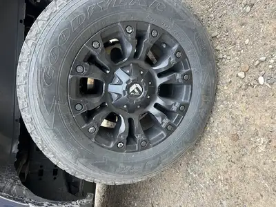 Fuel rims c/w with nuts , sensors. ( don't remember off set} 4 - Good Year Wrangler 275-65-18 Tires...