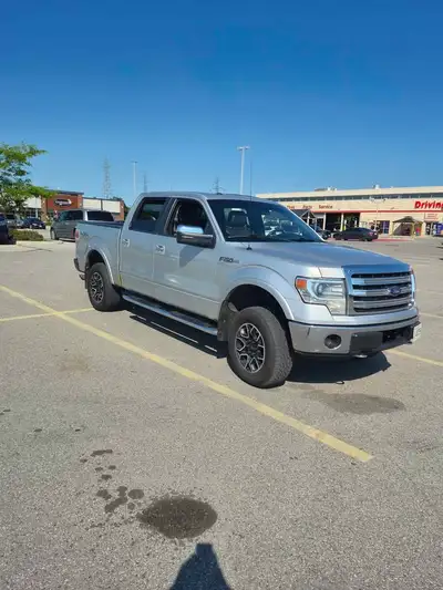 Selling my 2014 Ford F-150 Lariat with the 5.0L V8 engine. This truck runs and drives well and has b...