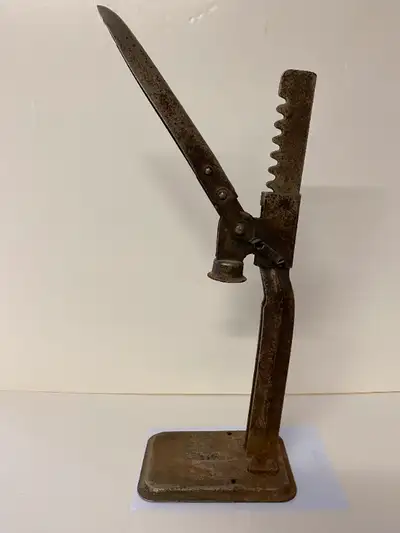 Vintage metal bottle capper; rusted cast iron Would make a unique door stop, brewery bar décor, rust...