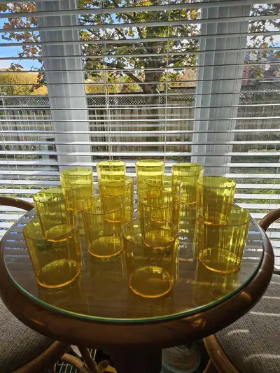 REDUCED: Set of 12 clear yellow plastic glasses, View more