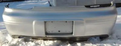 This is an original GM1100532 Pontiac rear bumper Galaxy Silver. Fits many years including 2001