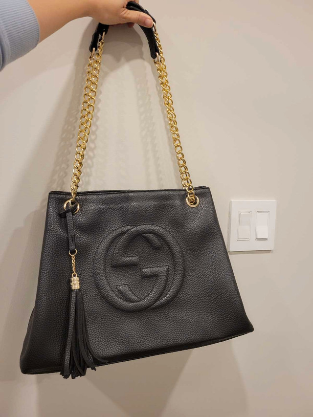 Black leather purse with golden color strap size large in Women's - Bags & Wallets in Markham / York Region