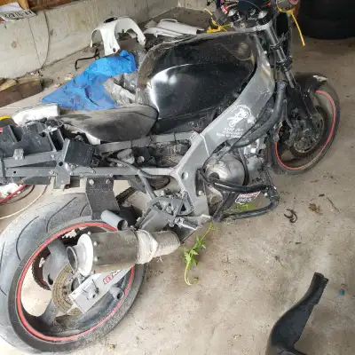 Engine is no good. Leaks oil . Cracked on the top end. Right side. Everything else is ok. Tank. 150....
