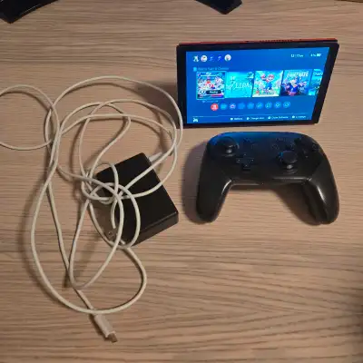 Nintendo Switch OLED, pro controller, Sd Card, charge and more, View more