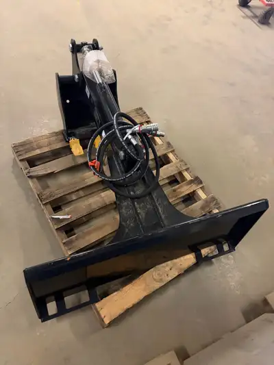Brand new backhoe attachment for skid steer. Will fit many brands of machines. Price is 1500 obo