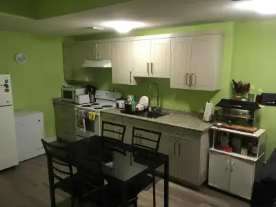 Basement suite with 2 bedrooms and 1 bathroom in Kensington neighborhood, has a separate entrance, s...