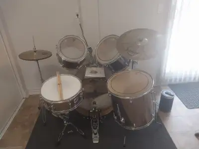 Drum kit with stool., View more