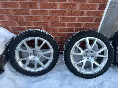 Original Audi Alloy Wheels with Dunlop Winter Tires 225/50R18 in very good condition. No scratches....