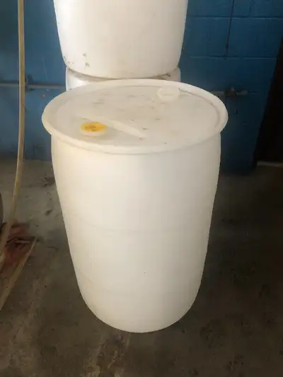 Plastic drums,they are clean. Many uses rain barrels, cottage dock or barge, two holes on top, air t...