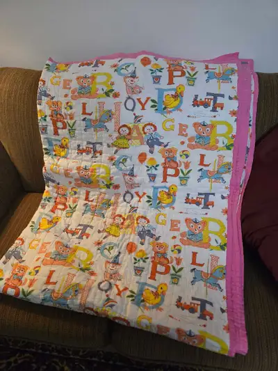 Children's alphabet quilt with pink backing, View more