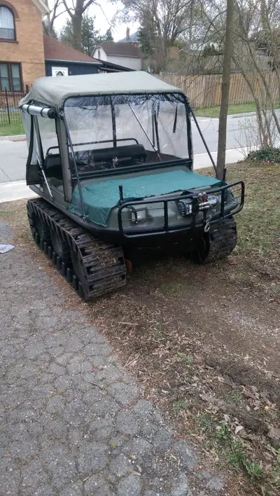 6 wheel argo with tracks and enclosed cab. All tires are good, engine runs good, new windshield. out...