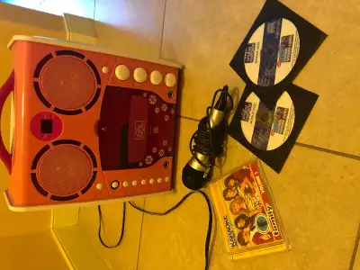 The Singing Machine Karaoke-pink plus 3 CDs, View more
