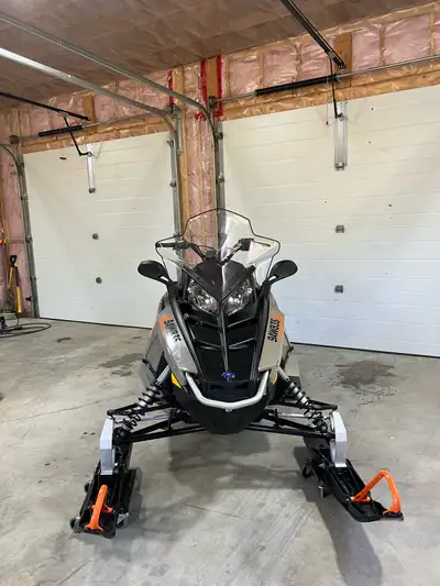 Like new, 2023 Polaris Indy 550 Fan XLT with 2 up seat. 273km on it, always stored in heated garage....