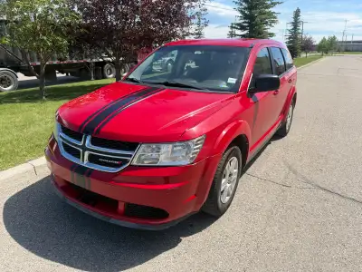 For sale Is a bright red Dodge Journey GT. Sharp looking SUV in good shape. Runs well and no issues...