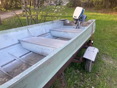 14’ boat with trailer and 15hp evinrude. Motor runs well. Good little boat for getting into small pl...