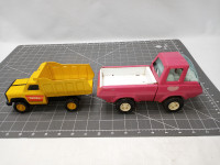 2 Vintage Pressed Metal Tonka Trucks