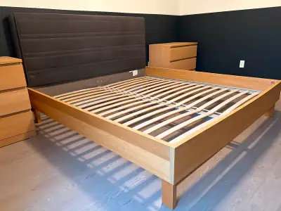 King size bed frame with padded head board. Great condition. All parts included and will dismantle f...