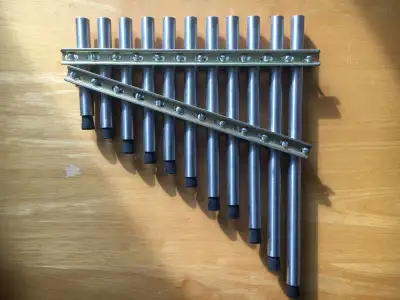 Selling a unique, one-of-a-kind handmade pan flute crafted from high-quality steel tubing. Unlike st...