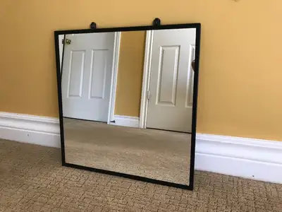 Mirror is in very good condition. Encased in black metal frame. Measures 15.25 inches square. Pick u...