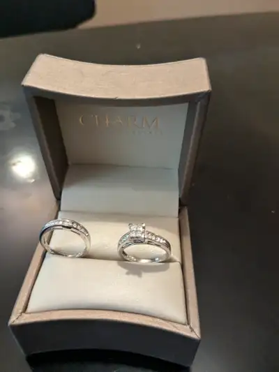 A Diamond Engagement and Wedding Set. In very good condition they have barely been worn, size 6. Ask...